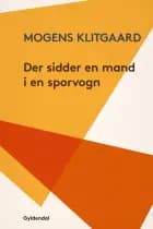 Der sidder en mand i en sporvogn