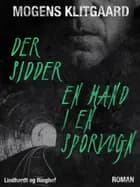 Der sidder en mand i en sporvogn