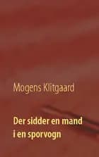 Der sidder en mand i en sporvogn