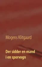 Der sidder en mand i en sporvogn
