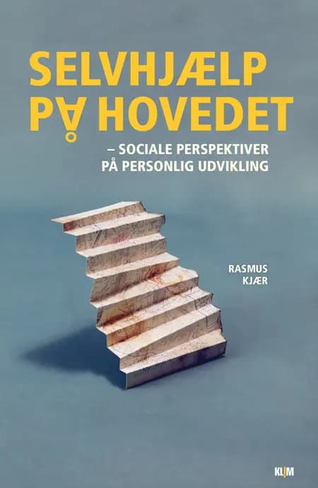 Selvhjælp på hovedet af Rasmus Kjær