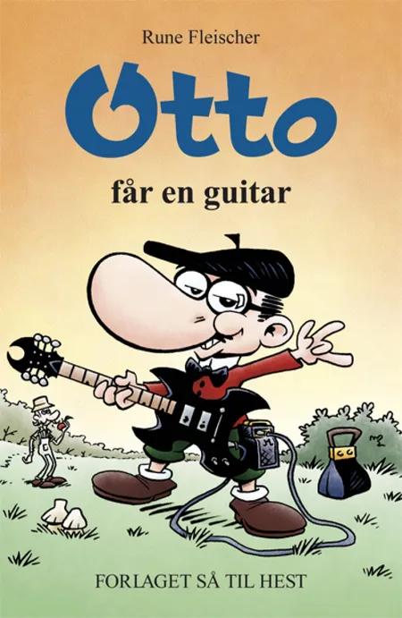 Otto får en guitar af Rune Fleischer